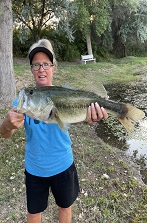 Guest and his big bass at Three Falls Cove